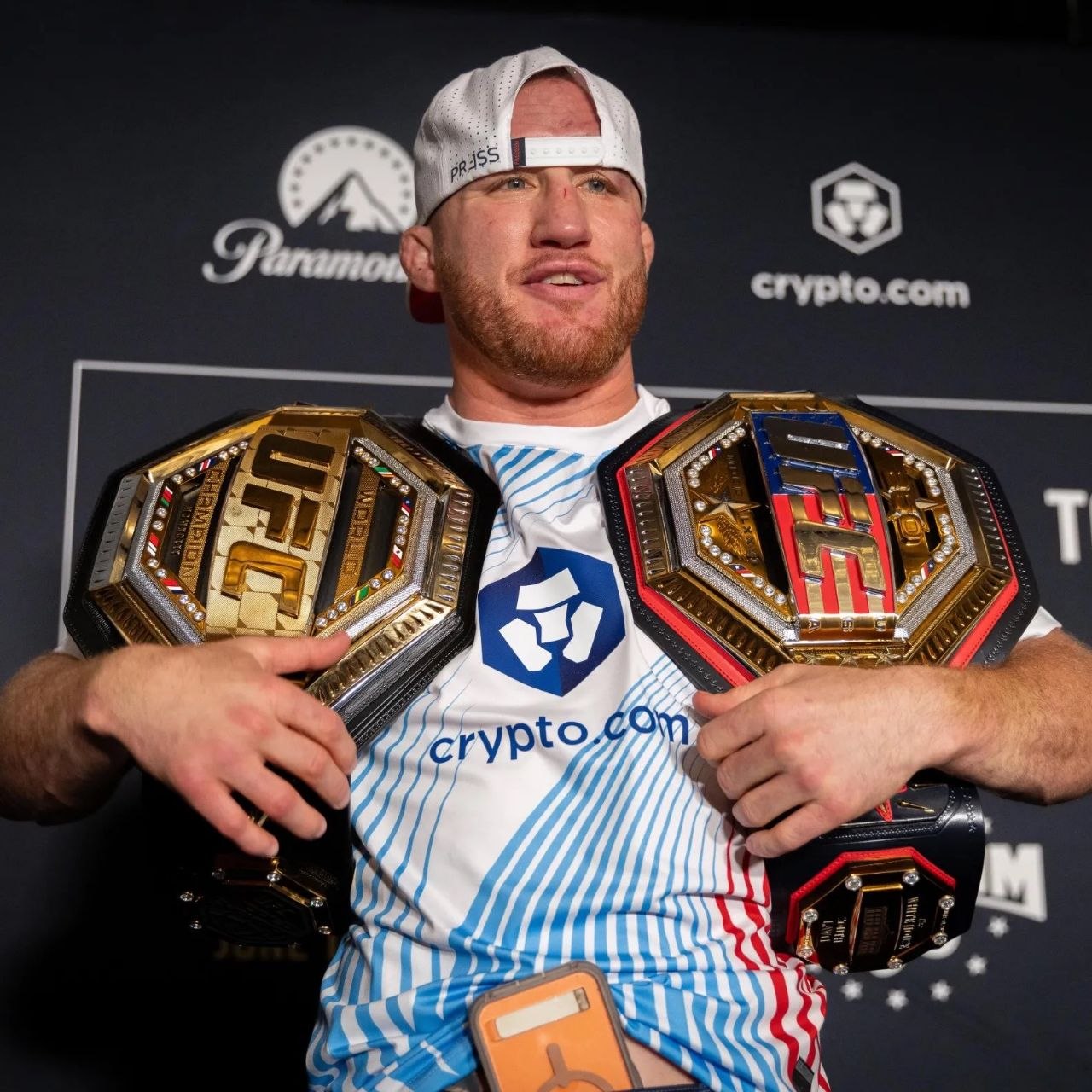 Justin Gaethje with his championship belts