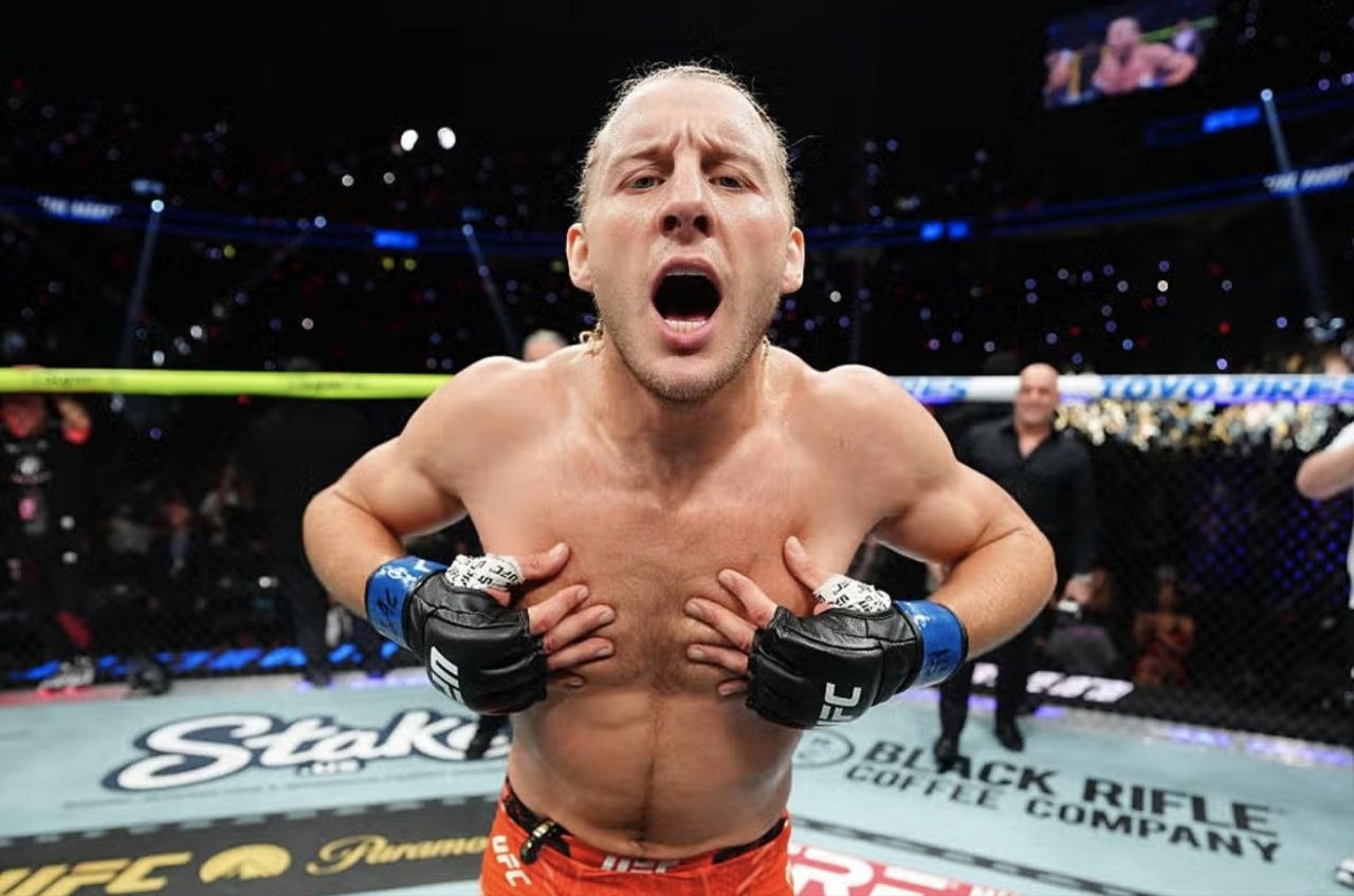 Paddy Pimblett celebrating his submission win at UFC 329
